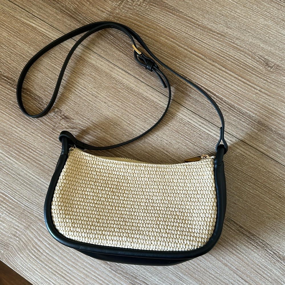 Black faux leather and rattan cross body bag